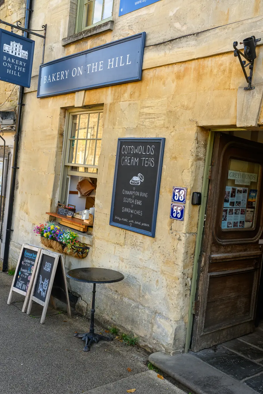 Bakery on the Hill, a Burford side street shopfront with chalkboard signs outside